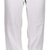 Obermeyer Women's Hillary Stretch Pant 2024 - A pair of white pants with a black button on the waistband, featuring two zippered pockets and a subtle patterned texture.