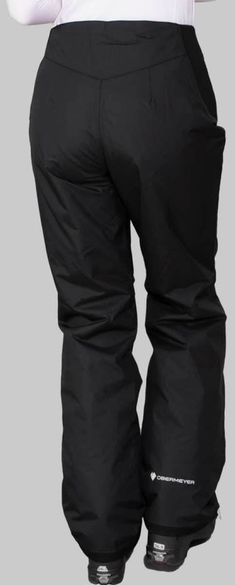 Obermeyer Women's Insulated Sugarbush Pant 2022-2023 - Black insulated ski pants with a subtle pattern of small, light-colored snowflakes on the left thigh.