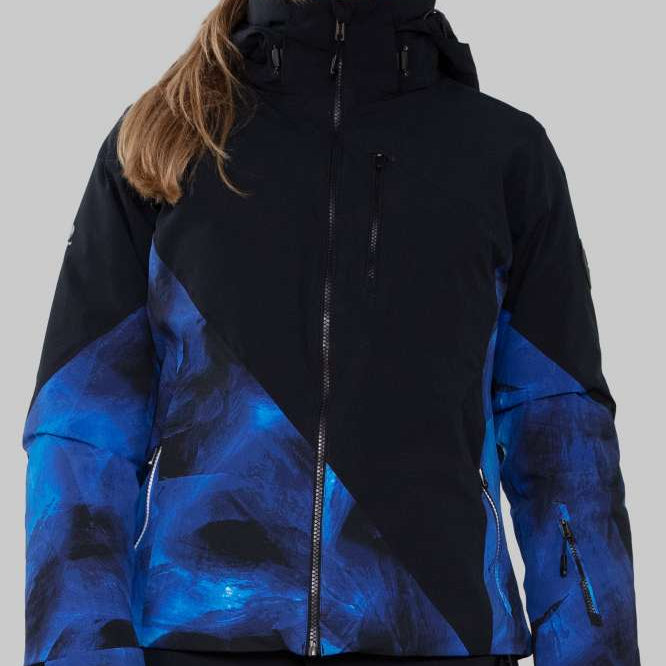 Obermeyer Women's Kayla Insulated Jacket Petite 2022-2023 - A black and blue abstract patterned jacket with a high collar, worn by a model with long brown hair in a ponytail.