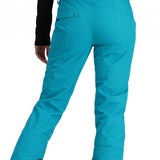 Obermeyer Women's Malta Insulated Pant 2024 - A pair of bright blue snow pants with a zippered pocket on the side and adjustable velcro straps at the waist.