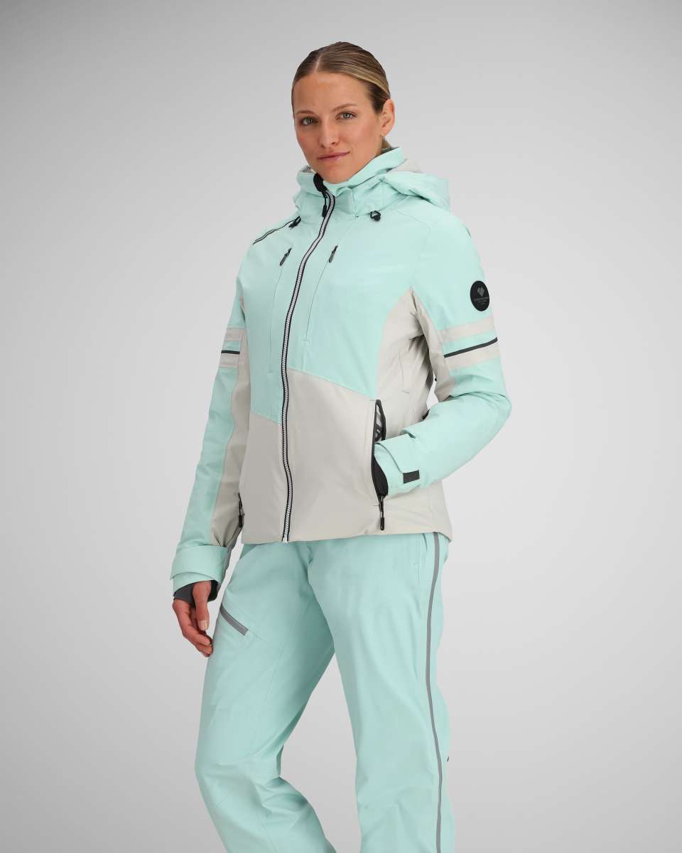 Obermeyer Women's Platinum Insulated Jacket 2024 - A light blue and white jacket with a hood, zipper closure, and black accents.