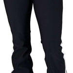 Obermeyer Women's The Bond SoftShell Pant 2024 - Black softshell pant with two silver buttons on waistband.