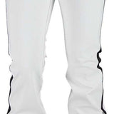 Obermeyer Women's The Bond SoftShell Pant 2024 - White snow pants with black stripe down side seam and two buttons on waistband.