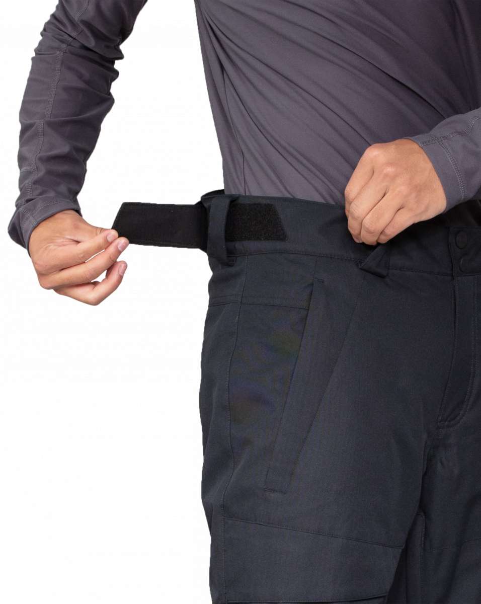 Obermeyer Orion Insulated Pant 2022-2023 - Black insulated ski pants with a black belt and zippered pockets.