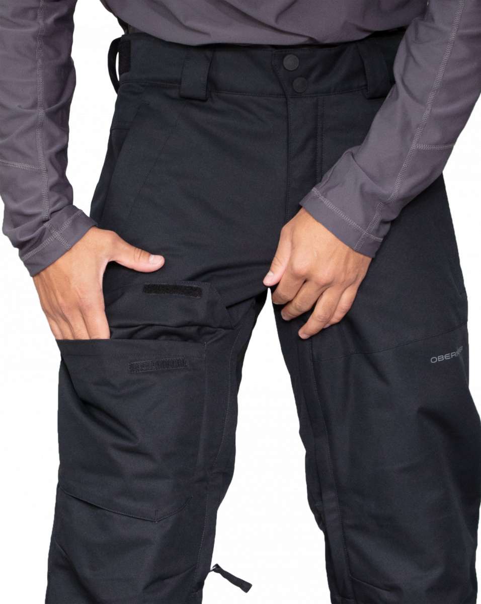 Obermeyer Orion Insulated Pant 2022-2023 - Black insulated ski pants with zippered pockets and adjustable cuffs.