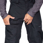 Obermeyer Orion Insulated Pant 2022-2023 - Black insulated ski pants with zippered pockets and adjustable cuffs.