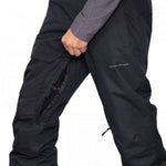 Obermeyer Orion Insulated Pant 2022-2023 - Black insulated ski pants with zippered pockets and adjustable cuffs.