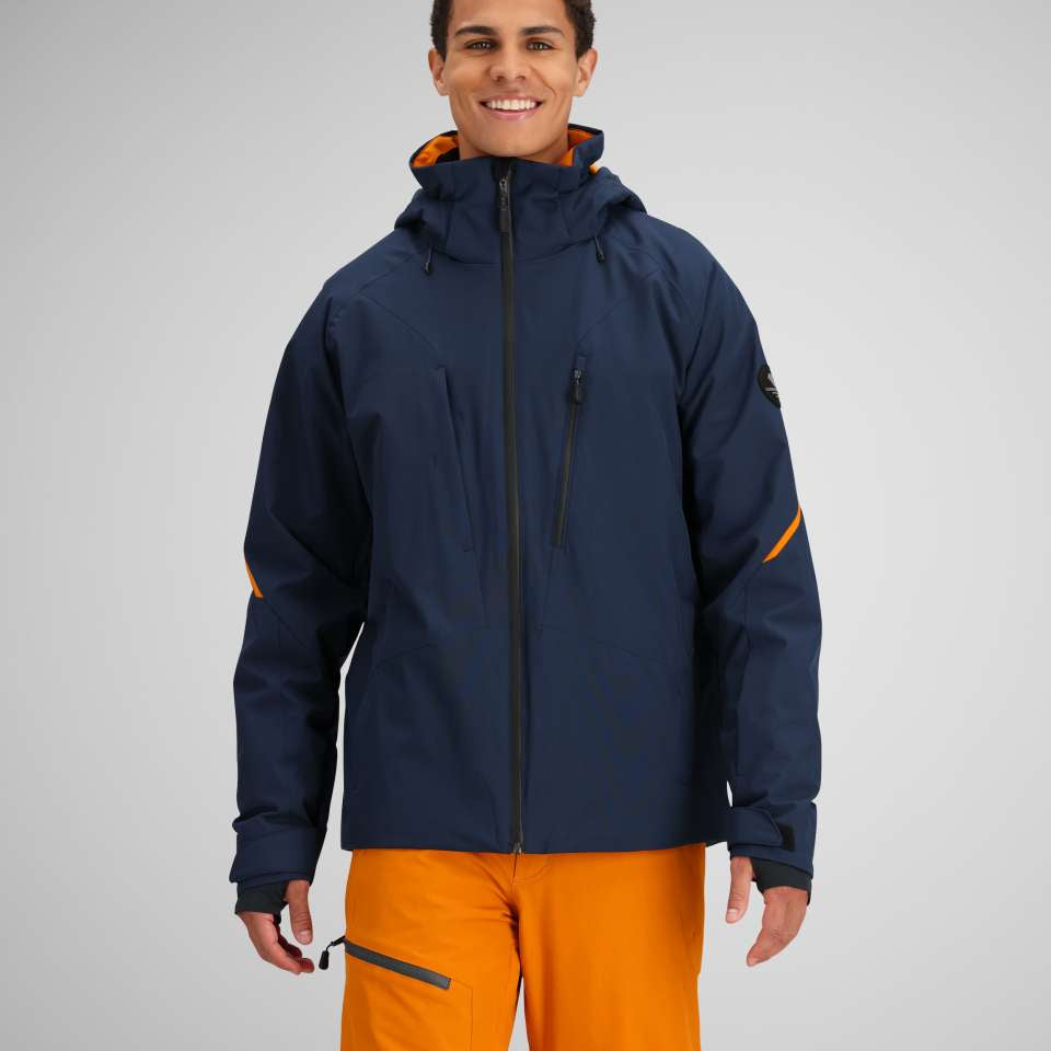 Obermeyer Raze Insulated Jacket 2024 - A navy blue jacket with orange accents on the inside of the hood and zipper.