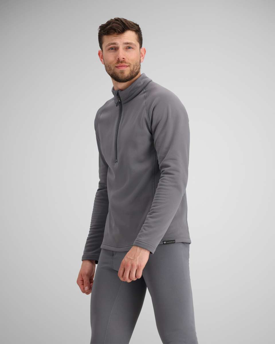 Obermeyer UltraGear 1/4 Zip Top 2024 - A heathered grey quarter-zip top with a black zipper and two zippered pockets on the side.