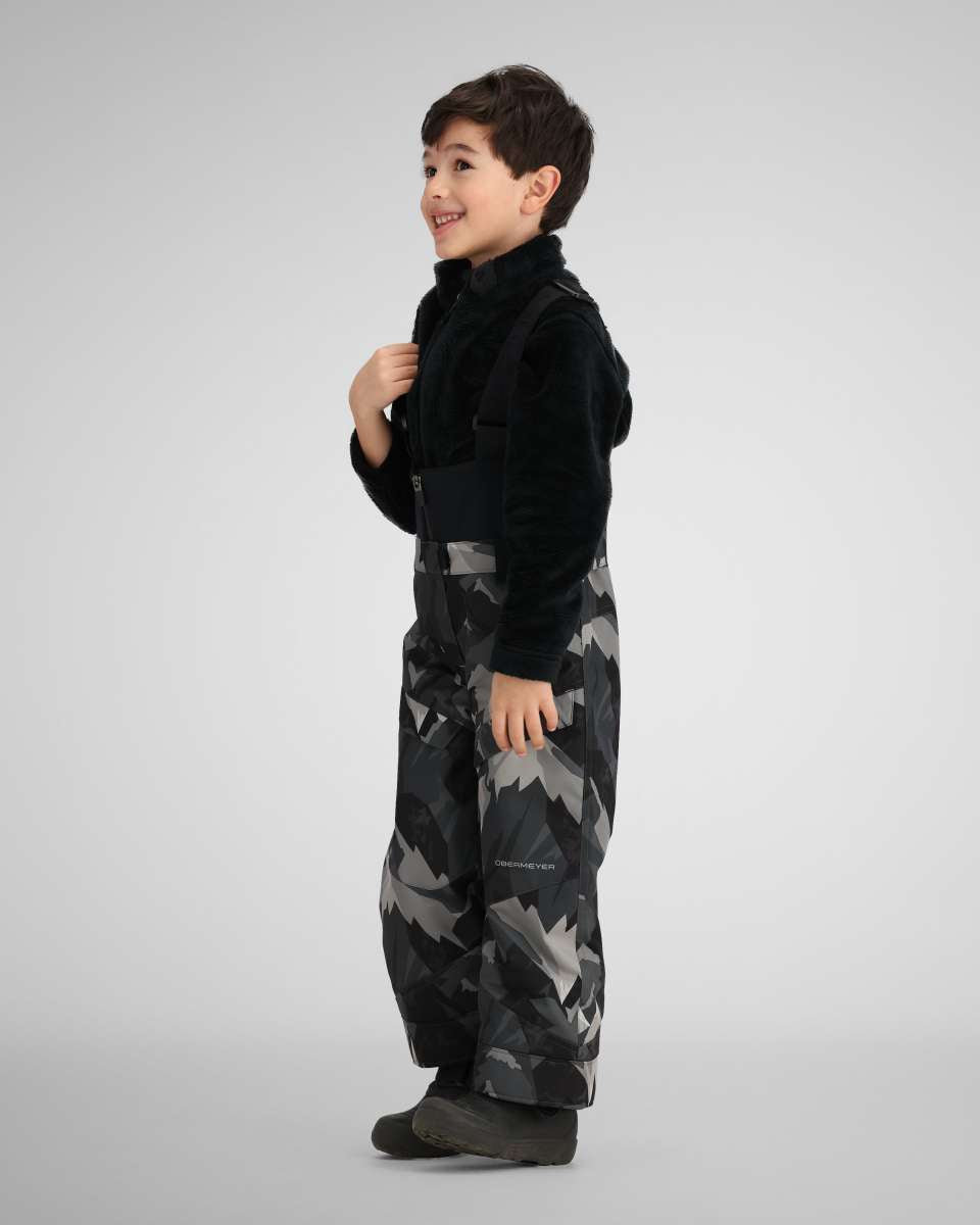 Obermeyer Youth Warp Insulated Bib Pants 2024 - Black insulated bib pants with a geometric pattern of gray and white triangles.