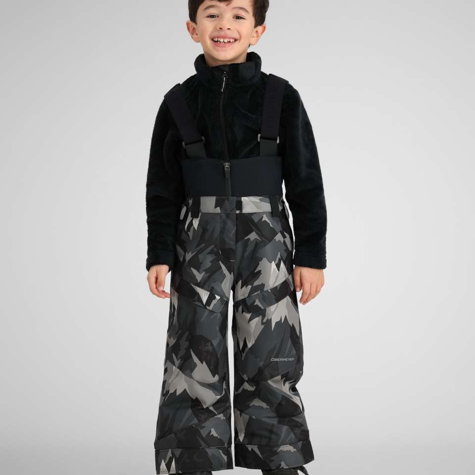 Obermeyer Youth Warp Insulated Bib Pants 2024 - Black insulated bib pants with a geometric pattern of light and dark gray shapes.