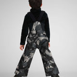 Obermeyer Youth Warp Insulated Bib Pants 2024 - Black bib pants with a geometric pattern of light gray and dark gray triangles on a black background.