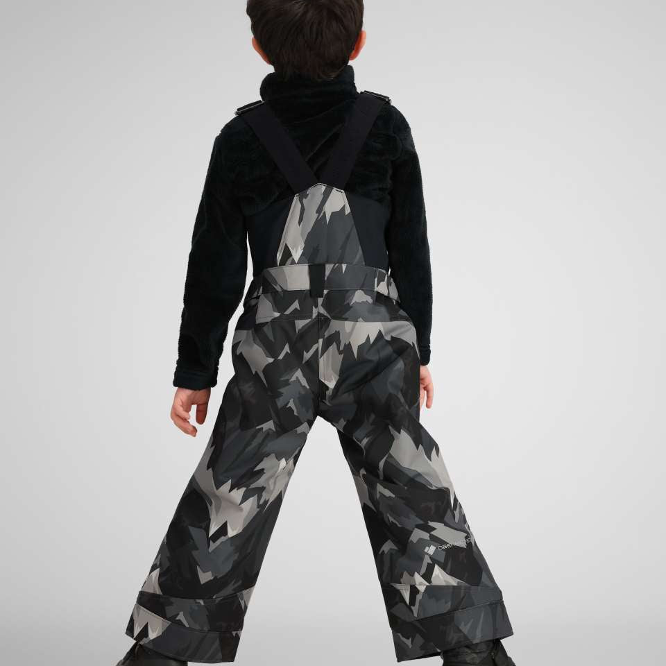 Obermeyer Youth Warp Insulated Bib Pants 2024 - Black bib pants with a geometric pattern of light gray and dark gray triangles on a black background.
