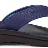 Olukai Ohana Sandals - Pair of navy-blue sandals with a textured strap and a small logo on the side.