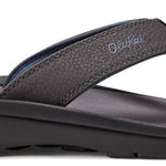 Olukai Ohana Sandals - Pair of gray sandals with a strap and toe post, featuring a small logo on the side.