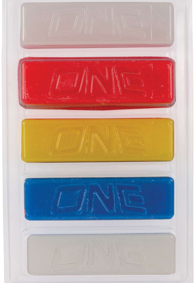 Oneball 4WD 5 Pack Wax 2022-2023 - Five rectangular wax bars in a clear plastic package, each with a different color: red, yellow, blue, gray and white.