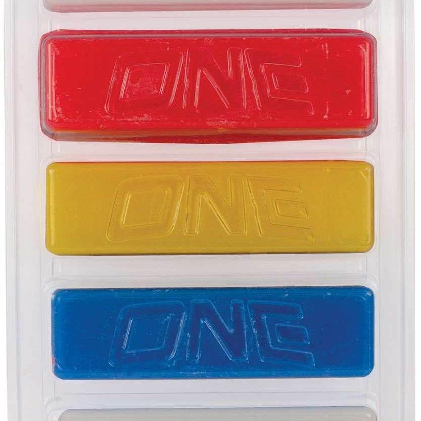 Oneball 4WD 5 Pack Wax 2022-2023 - Five rectangular wax bars in a clear plastic package, each with a different color: red, yellow, blue, gray and white.