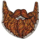 Oneball Beardo Stomp Pad 2024 - A bearded man with a mustache and long hair, wearing a black shirt, holding a snowboard in his right hand.