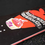 Oneball Cupcake Stomp Pad 2022-2023 - A pink cupcake with white frosting and a single lit candle on top, sitting atop a beige square with cursive writing in purple.