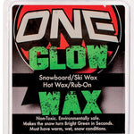Oneball F1 Glow Wax Warm 32-28f 2024 - A red and black wax with a circular logo in the background.