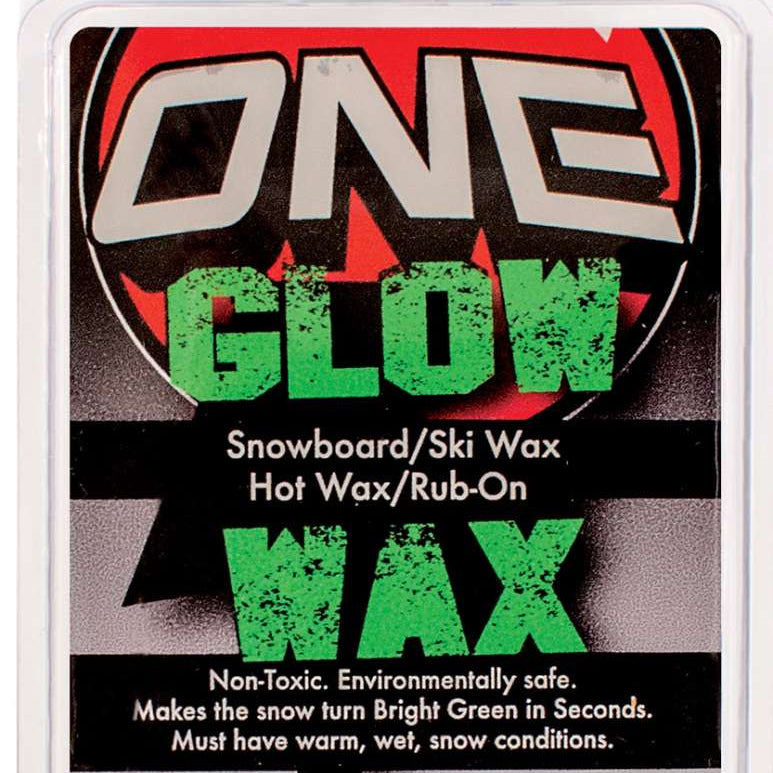 Oneball F1 Glow Wax Warm 32-28f 2024 - A red and black wax with a circular logo in the background.