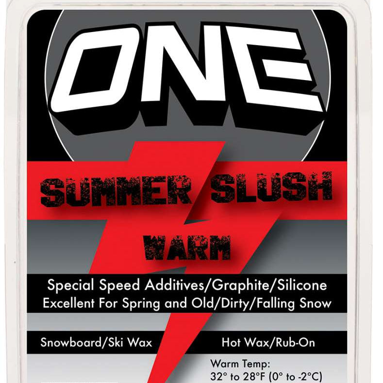 Oneball F1 Summer Slush Wax - A red wax block with a white label and black text, featuring a snowboarder riding down a mountain in the background.