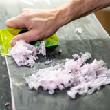 Oneball F1 Summer Slush Warm Wax 2024 - A small, rectangular box with a yellow label and black text.