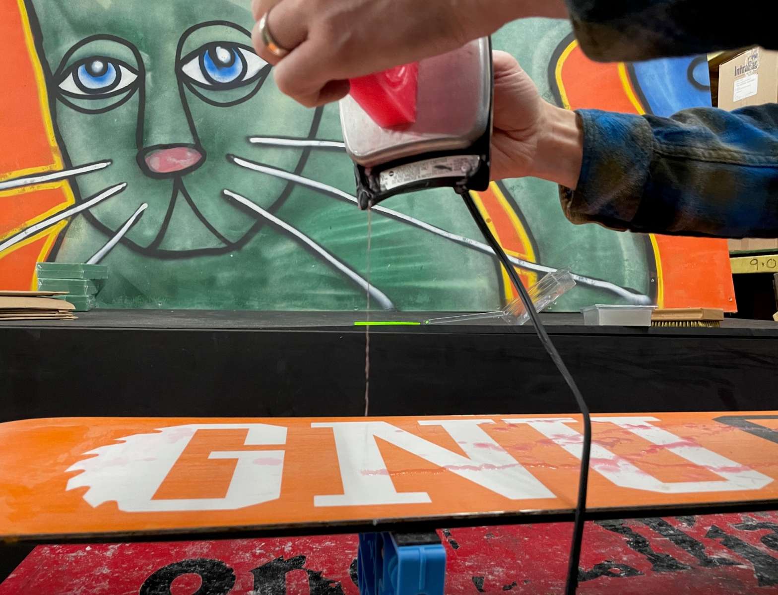 Oneball F1 Summer Slush Warm Wax - A small, rectangular box with a red lid and white lettering on its side.