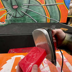 Oneball F1 Summer Slush Warm Wax - A red rectangular bar of wax with a circular logo on top.