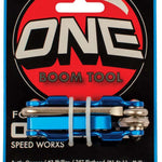 Oneball Folding Tool 2024 - Compact tool with silver metal components, including a screwdriver and wrench, neatly folded into a blue plastic case.