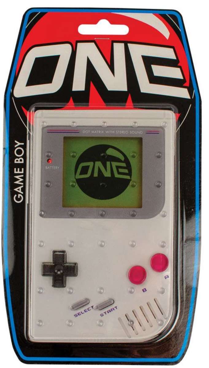 Oneball Game Boy Stomp Pad 2024 - A gray plastic stomp pad with a red button in the center and a white logo that says "ONE" on top.