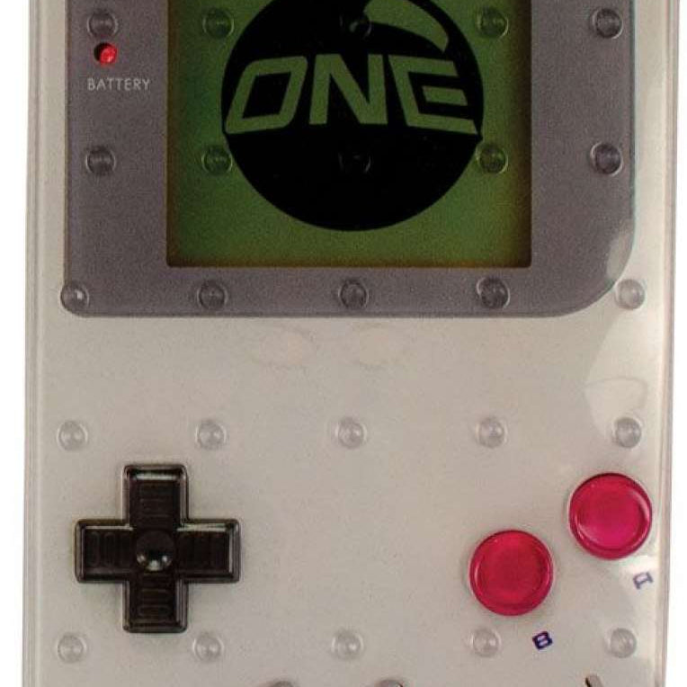 Oneball Game Boy Stomp Pad 2024 - A small, round, black rubber pad with a circular indentation in the center.