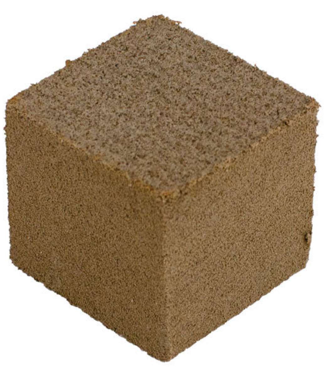 Oneball Gummy Stone 2024 - A brown cube with a rough, porous texture and small holes throughout.