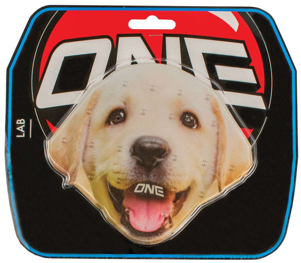 Oneball Lab Stomp Pad - A tan-colored dog with a black nose and dark eyes is looking directly at the camera, its mouth slightly open as if smiling.
