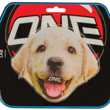 Oneball Lab Stomp Pad - A tan-colored dog with a black nose and dark eyes is looking directly at the camera, its mouth slightly open as if smiling.