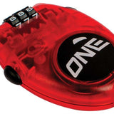 Oneball Mini Lock - Small black plastic box with a circular indentation on top, featuring white numbers and letters.