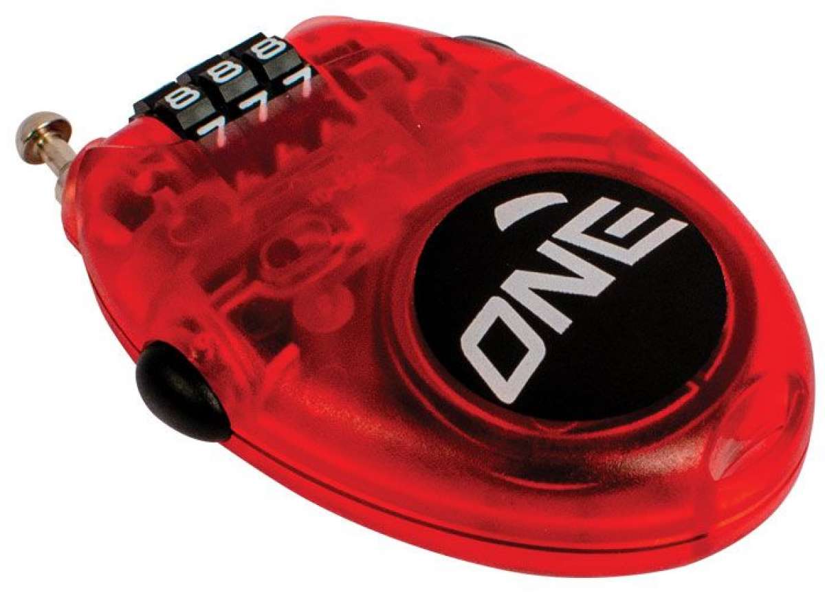 Oneball Mini Lock - Small black plastic box with a circular indentation on top, featuring white numbers and letters.