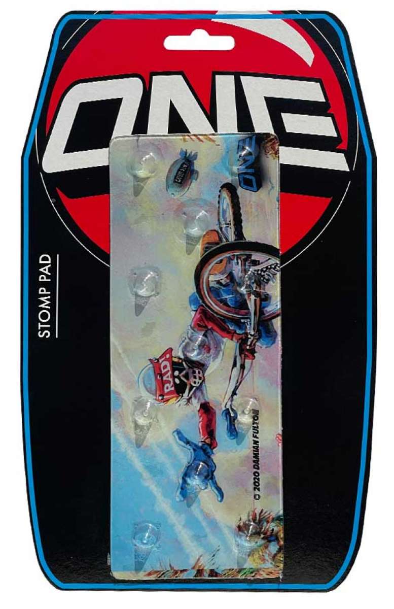 Oneball Radical Rick Stomp Pad - A red, black, and white stomp pad with a cartoon character riding a skateboard on it.