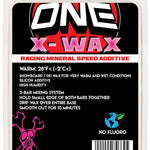 Oneball X-Wax Warm 2024 - A red can with a white label and black text, featuring a snowboarder riding down a mountain on the front.