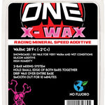 Oneball X-Wax Warm 28F - A red and black can with a white label featuring a snowboarder in action, set against a light gray background.
