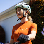 Outdoor Tech Mantas 2.0 Wireless Earbuds - A pair of white wireless earbuds with a black carrying case.