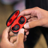 Outdoor Tech Pearls Wireless Earbuds - Black earbuds with red accents in a black case.