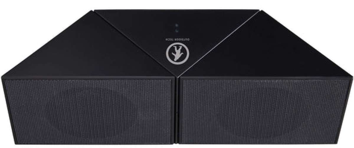 Outdoor Tech Twin Peaks Portable Speaker - A black rectangular speaker with a mesh front and angled top, featuring two small blue lights on its left side.