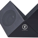 Outdoor Tech Twin Peaks Portable Speaker - A black portable speaker with a mesh front and a circular logo featuring a mountain peak design.