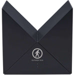 Outdoor Tech Twin Peaks Portable Speaker - A black, rectangular portable speaker with a flat top and angled sides.