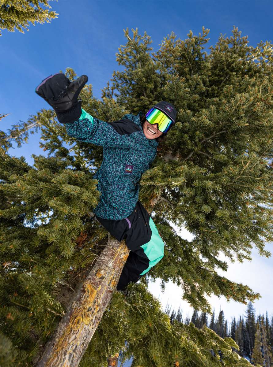 Quiksilver High Altitude 2L GORE-TEX Shell Jacket 2023 - A blue and black jacket with a snowboarder on it, wearing goggles and holding a ski pole.