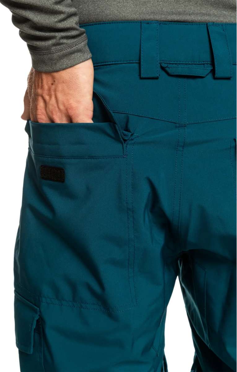 Quiksilver Porter Insulated Pant 2024 - A pair of insulated pants with a zippered pocket on the side and a black logo patch near the bottom hem.