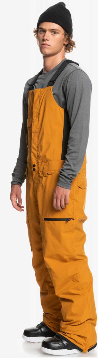 Quiksilver Utility Shell Bib - Bib pants with black zippers, pockets, and buckles on a gray background.