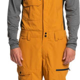 Quiksilver Utility Shell Bib - Black bib overalls with utility pockets on thighs and chest, black zipper fly, and adjustable straps.