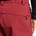 Quiksilver Utility Shell Pant 2023 - A pair of red snow pants with zippered pockets and a utility belt.